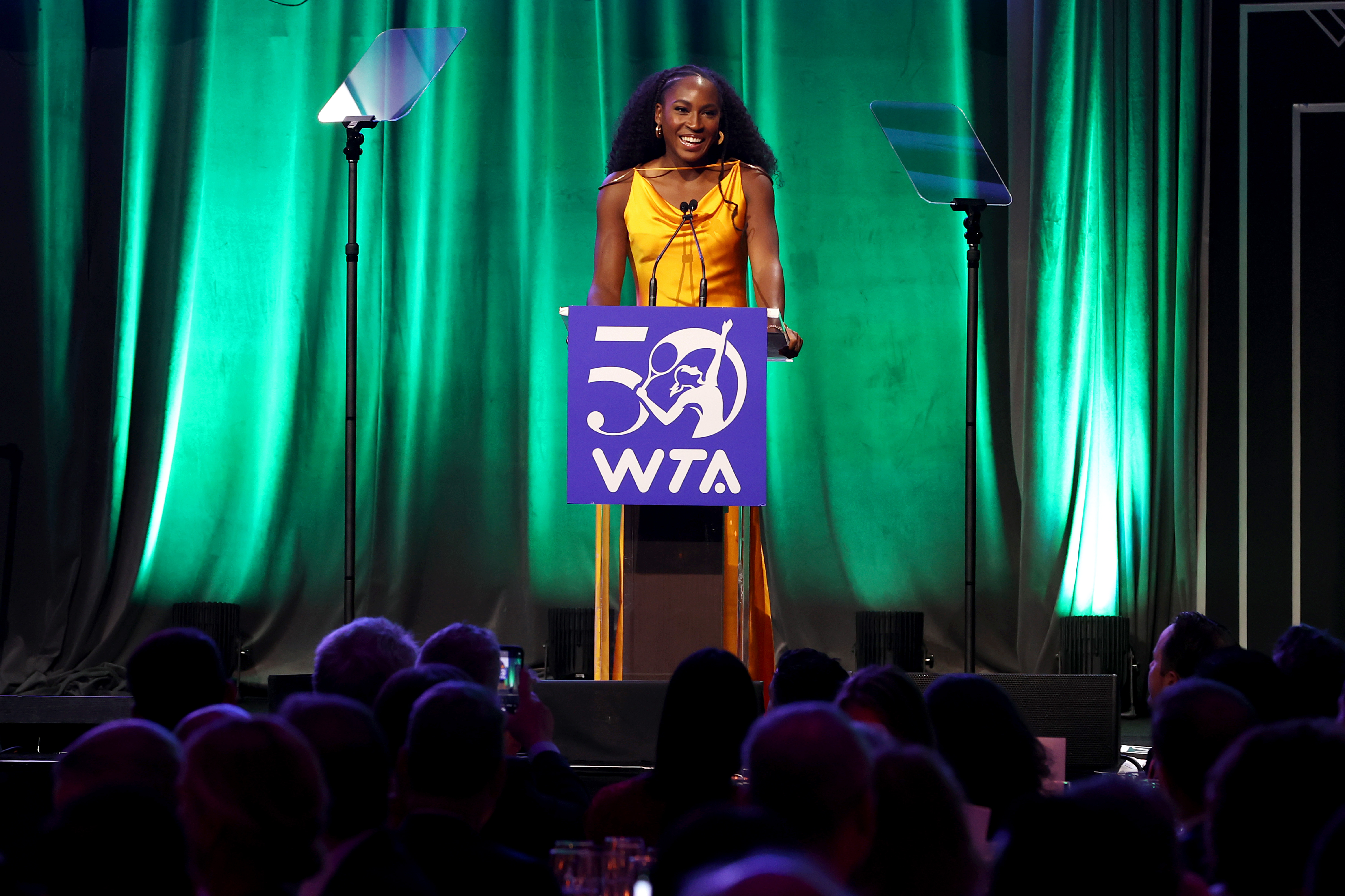 NEW YORK, NEW YORK - AUGUST 25: Coco Gauff speaks onstage during the WTA 50th Anniversary Gala at The Ziegfeld Ballroom on August 25, 2023 in New York City. (Photo by Clive Brunskill/Getty Images)