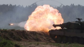 A Polish Leopard 2PL tank during a Defender Europe 2022 military exercise of NATO troops including those from France, the U.S. and Poland, at the military range in Bemowo Piskie, near Orzysz, Poland, on May 24, 2022.