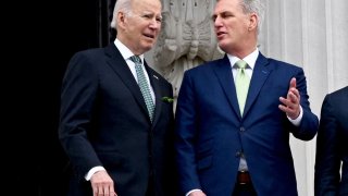 (L-R) US President Joe Biden, Speaker of the House Kevin McCarthy, Republican of California, depart after the annual Friends of Ireland luncheon on St. Patrick’s Day at the US Capitol in Washington, DC, on March 17, 2023.