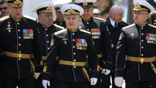 Commander of the Russian Black Sea Fleet Vice-Admiral Viktor Sokolov (C) attends a ceremony marking 240th anniversary of Russia’s Black Sea Fleet in Sevastopol, Crimea May 13, 2023.