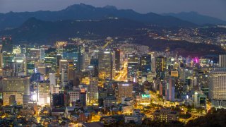 Aerial view of the capital city of Seoul in South Korea, seen at sunset.