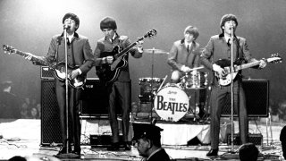 WASHINGTON, D.C. – FEBRUARY 11:  Rock and roll band “The Beatles” perform onstage at the Washington Coliseum on Feb. 11, 1964 in Washington, D.C.  (L-R) Paul McCartney, George Harrison, Ringo Starr, John Lennon.