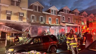 Firefighters respond to a deadly fire in Allentown early Sunday.