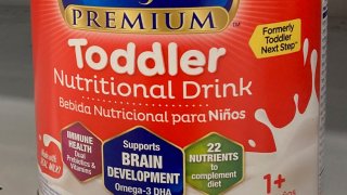FILE - A can of toddler nutritional drink sits on a shelf in a grocery store