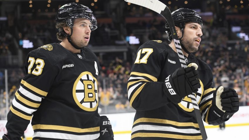 Charlie McAvoy and Milan Lucic