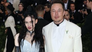 File - Grimes and Elon Musk at Metropolitan Museum of Art on May 7, 2018, in New York City.