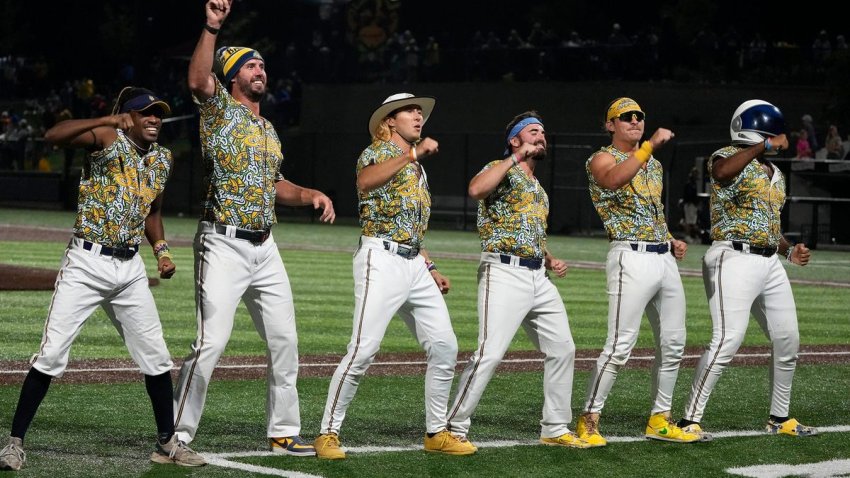 Members of The Savannah Bananas do a dance routine during the exhibition baseball game against the Party Animals at Franklin Field in Franklin on Friday, Sept. 8, 2023.