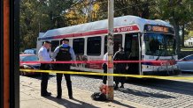 Police officers investigate after a SEPTA bus driver was shot in Germantown on Thursday morning.