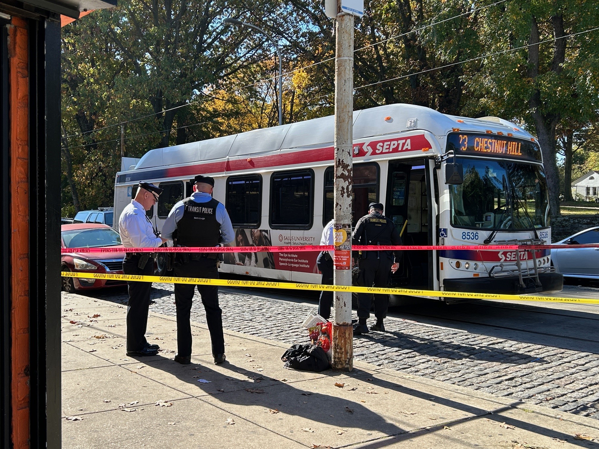 Police officers investigate after a SEPTA bus driver was shot in Germantown on Thursday morning. 