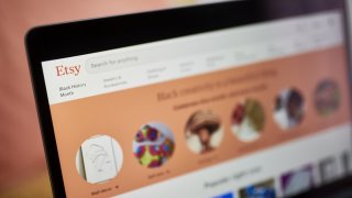 The Etsy website displayed on a laptop.