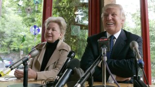 Tycoon Donald Trump with sister Maryanne Trump Barry, at a press conference after visiting the house in Tong, on the Isle of Lewis, where his mother was brought up before she emigrated to the United States.