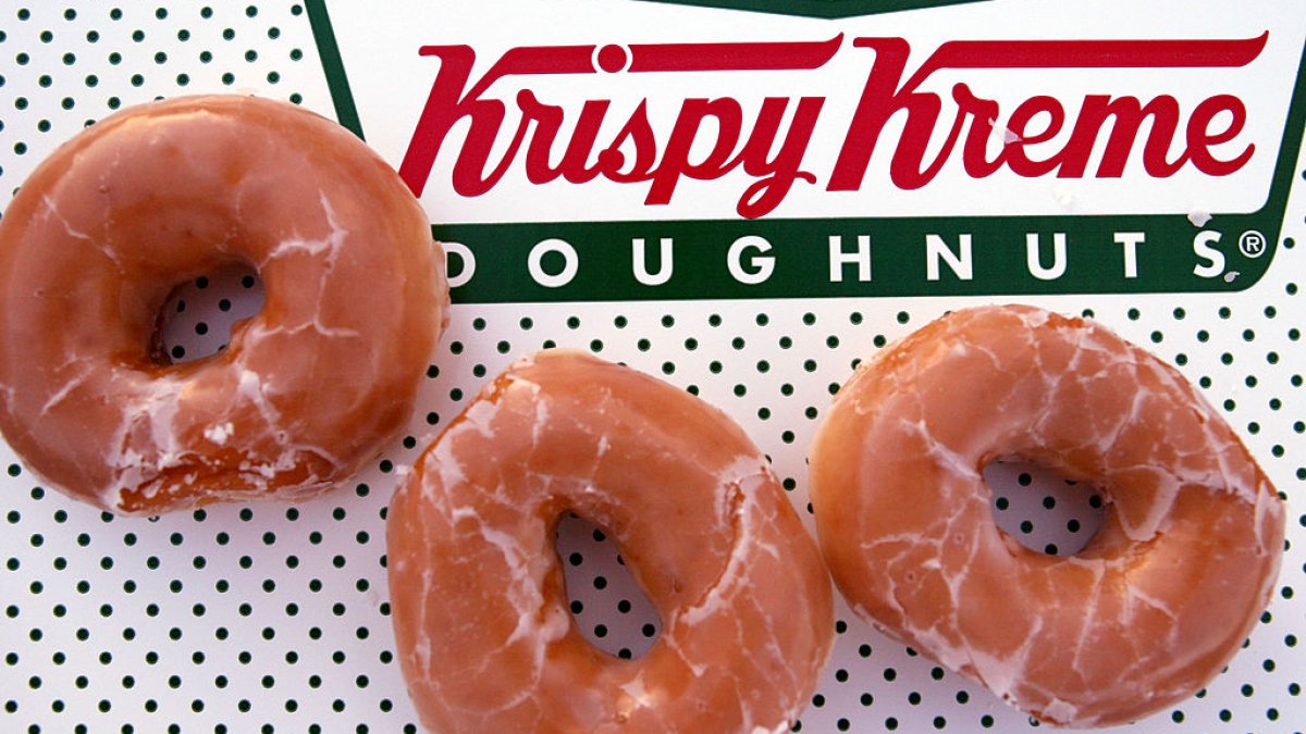 Krispy Kreme is giving customers a dozen free doughnuts on World