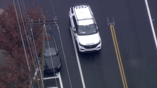 Police car blocking street
