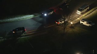 Police cars on dark street