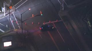 Police investigate after a 27-year-old man was killed while riding a bicycle along White Horse Pike in Berlin, New Jersey, on Monday morning.