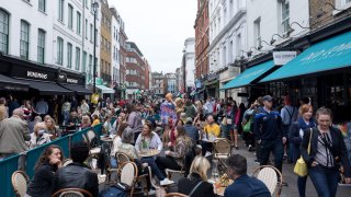 LONDON, UK – Sept. 2021: People seen dining outdoors in Soho in London in September 2021.
