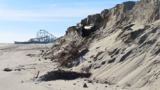 A severely eroded section of sand dune lines the beach in North Wildwood N.J.