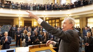Gov. Phil Murphy points while addressing New Jersey lawmakers.