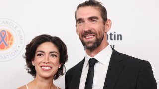 Nicole Johnson and Michael Phelps attend the 23rd annual Harold & Carole Pump Foundation Gala at The Beverly Hilton.