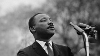 MONTGOMERY, AL – MARCH 25:  Dr Martin Luther King Jr speaking before crowd of 25,000 Selma To Montgomery, Alabama civil rights marchers, in front of Montgomery, Alabama state capital building. On March 25, 1965 in Montgomery, Alabama. (Photo by Stephen F. Somerstein/Getty Images)