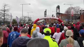 Runners approach starting line at Phillies Charities 5K