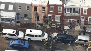 Firefighters on scene of a house fire in Kensington