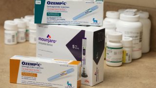 A pharmacist displays boxes of Ozempic, a semaglutide injection drug used for treating type 2 diabetes made by Novo Nordisk, at Rock Canyon Pharmacy in Provo, Utah, U.S. March 29, 2023. 