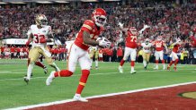 Mecole Hardman Jr. of the Kansas City Chiefs celebrates after catching the game-winning touchdown in overtime to defeat the San Francisco 49ers 25-22 during Super Bowl LVIII at Allegiant Stadium on Feb. 11, 2024 in Las Vegas, Nevada. 