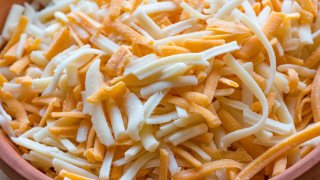 Mixture of shredded cheddar and mozzarella cheese