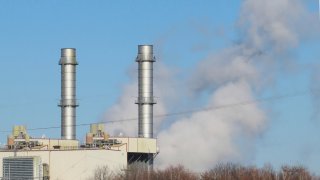 A gas-fired power plant in Linden, N.J., is seen on Feb. 29, 2024. On March 4, 2024, New Jersey lawmakers watered down a proposed referendum on whether to ban construction of new power plants that burn fossil fuels, adding a loophole that allowed for construction of new emergency backup plants that burn fossil fuels.