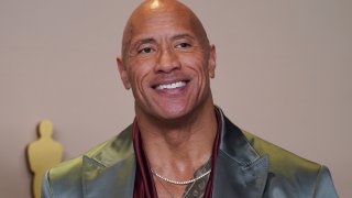 FILE – Dwayne “The Rock” Johnson poses in the press room at the Oscars on March 10, 2024, in Los Angeles.