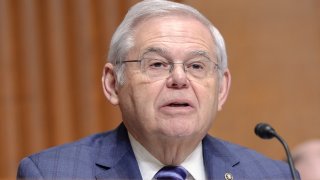 FILE – Sen. Bob Menendez, D-N.J., asks a question during a Senate Finance Committee hearing on Capitol Hill Thursday, March 14, 2024, in Washington. Menendez’s bribery trial was moved forward a week to mid-May on Friday, April 18, 2024, after lawyers agreed the extra days would aid trial preparation. (AP Photo/Mariam Zuhaib, File)