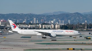 hina Eastern Airlines Boeing 777-39P arrives in Los Angeles