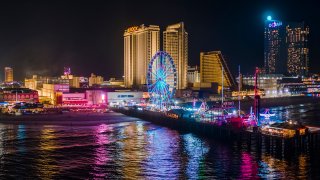 The Atlantic City boardwalk, Steel Pier and some resorts.