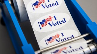 IRVINE, CA – November 08: Voters pick up their I Voted sticker at Irvine Valley College in Irvine, CA on Tuesday, November 8, 2022. (Photo by Paul Bersebach/MediaNews Group/Orange County Register via Getty Images)