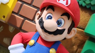 Mario poses at the “SUPER NINTENDO WORLD” welcome celebration at Universal Studios Hollywood on February 16, 2023 in Universal City, California.