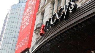 The Macy’s company logo is seen at the Macy’s store on Herald Square on January 19, 2024 in New York City. Macy’s department-store chain announced that they will be laying off roughly 2,350 employees which is about 3.5% of their workforce. The company says that it will also be closing five stores in order to adjust to the online-shopping era. (Photo by Michael M. Santiago/Getty Images)