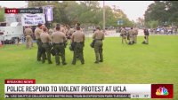 Police putting up barricades on UCLA campus after overnight brawl