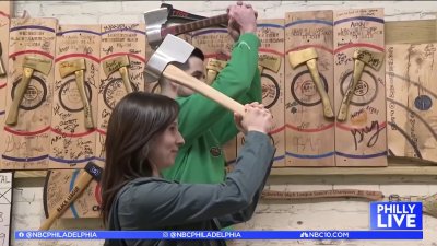 Sheila Watko learns the art of axe and knife-throwing from world champion