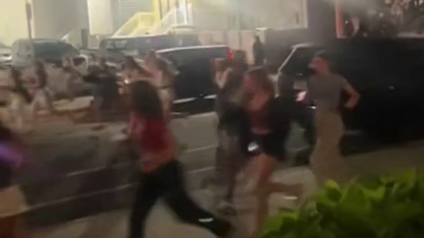 Crowds flee after a juvenile was stabbed on the Ocean City, NJ, boardwalk on Saturday night.