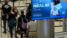 Travelers move through Hartsfield-Jackson Atlanta International Airport ahead of Memorial Day, Friday, May 24, 2024, in Atlanta.(AP Photo/Mike Stewart)