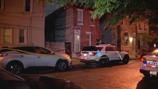 Police investigate after a woman was shot in an incident along Croskey Street in North Philadelphia early Sunday.