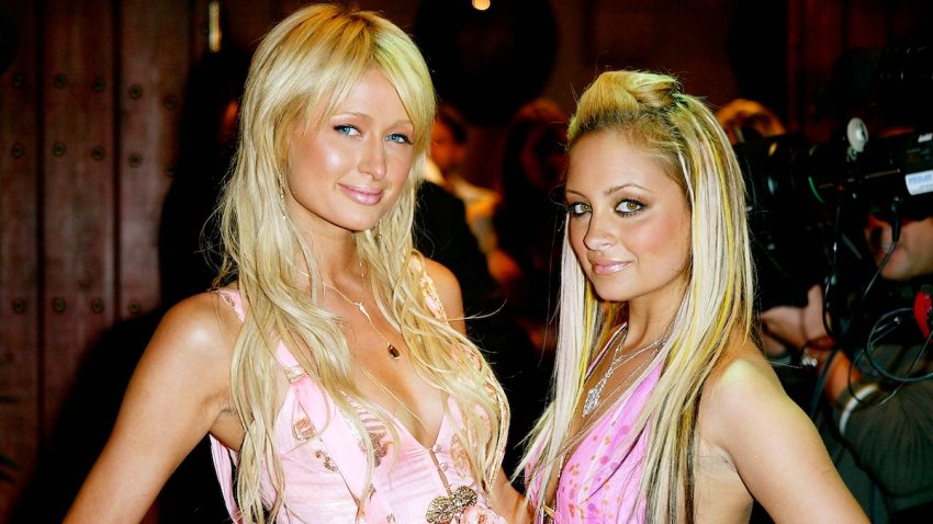 FILE – Nicole Richie and Paris Hilton (L) arrive for the “Simple Life 2” Welcome Home Party at The Spider Club  on April 14, 2004 in Hollywood, California.