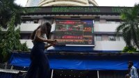 India stocks sink 5% to lead Asia markets lower as election vote counting signals close contest for Modi