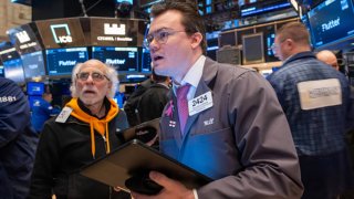 Traders work on the floor of the New York Stock Exchange on Jan. 29, 2024.
