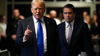 Former U.S. President Donald Trump walks to speak to the media after being found guilty following his hush money trial at Manhattan Criminal Court in New York City on May 30, 2024.