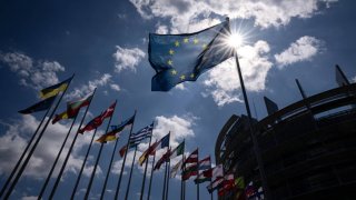 This photograph shows European countries’ flags waving in front of the European Parliament building in Strasbourg, eastern France, on June 6, 2024. (Photo by SEBASTIEN BOZON / AFP) (Photo by SEBASTIEN BOZON/AFP via Getty Images)