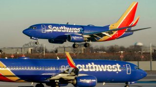 Southwest Airlines plane prepares to land at Midway International Airport, Feb. 12, 2023, in Chicago. Southwest Airlines is back in court over firing a flight attendant with anti-abortion views.