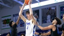 Olivier Rioux of IMG Academy looks for an open teammate in their game against Richmond Heights in the City of Palms Classic on Wednesday, Dec. 20, 2023, at Suncoast Credit Union Arena in Fort Myers.