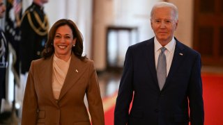 U.S. President Joe Biden and U.S. Vice President Kamala Harris walk to the East room to welcome the 2023 WNBA champion Las Vegas Aces during a celebration at the White House in Washington, U.S., May 9, 2024. 